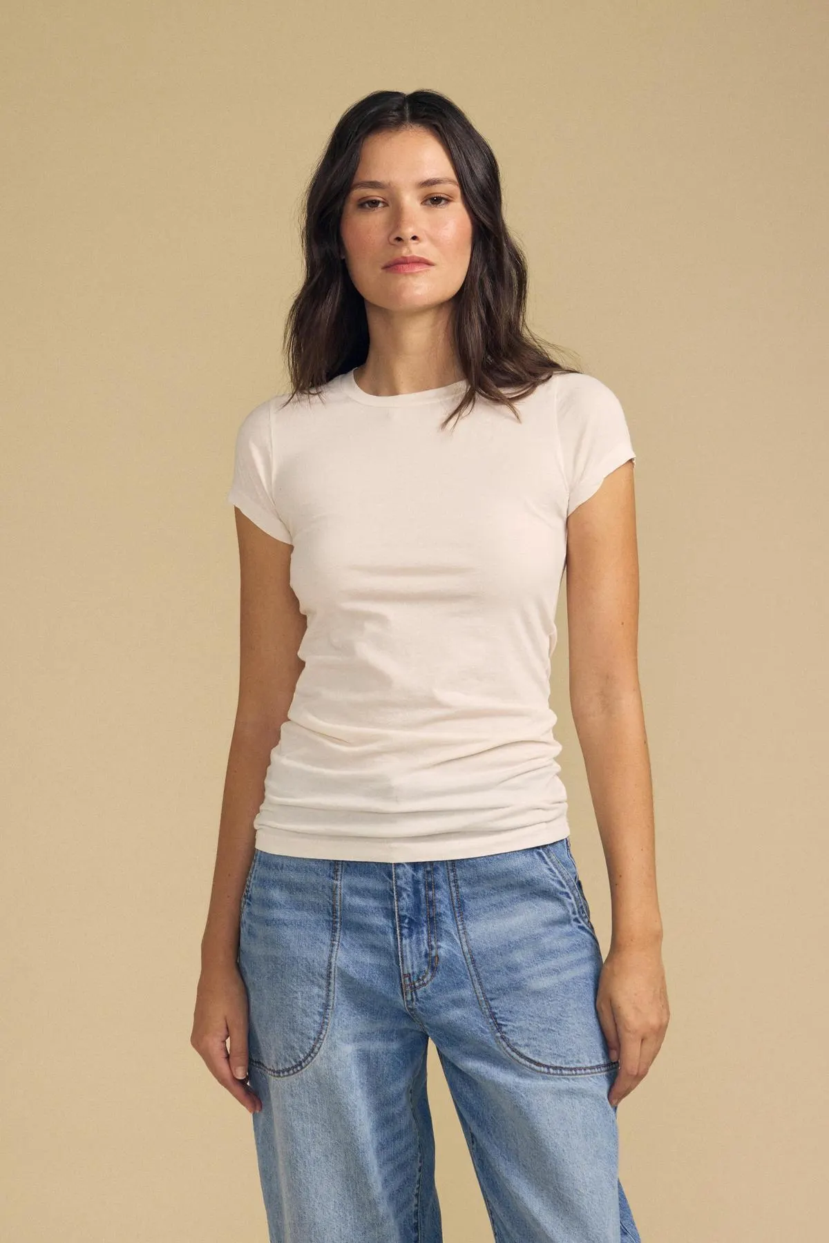 Velvet tee in cream, worn with jeans